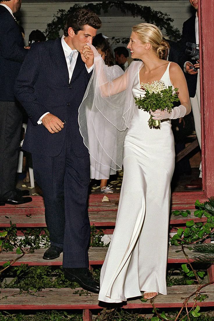 Carolyn Bessette Kennedy wearing her silk slip wedding dress at her 1996 wedding