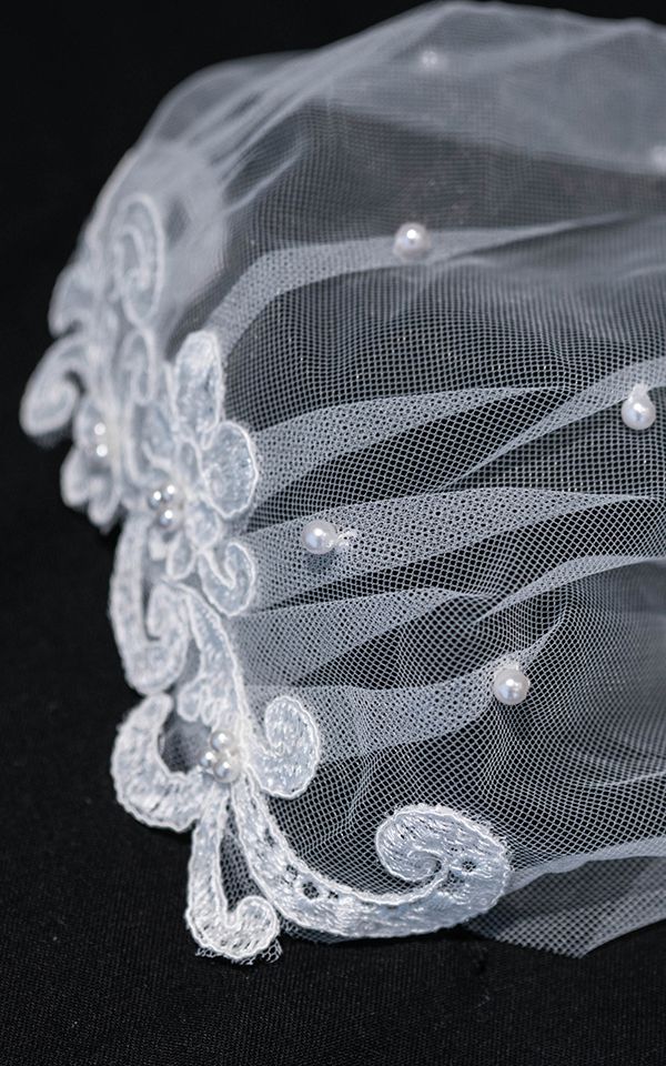 TILA VEIL